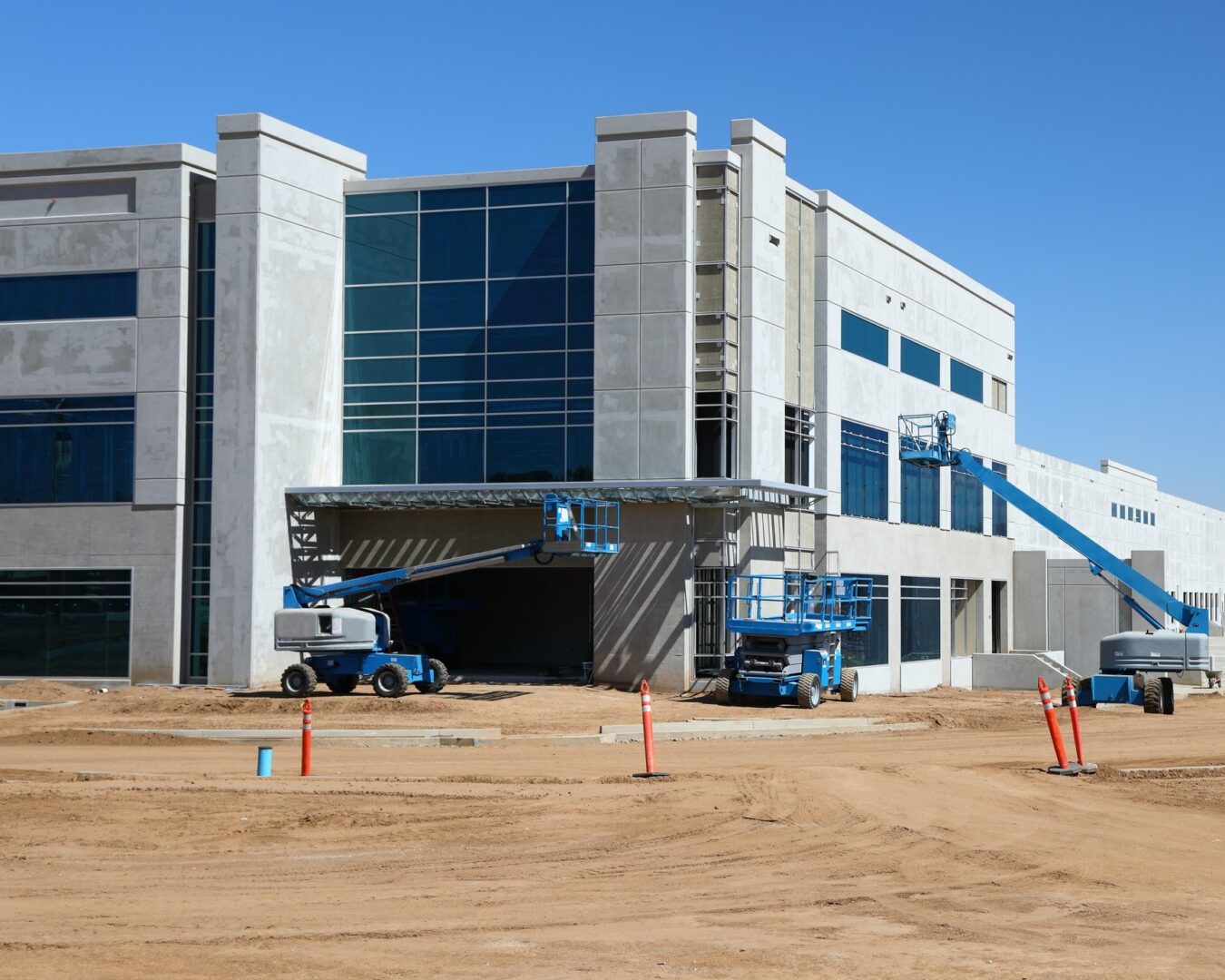 Construction site with glass facade building