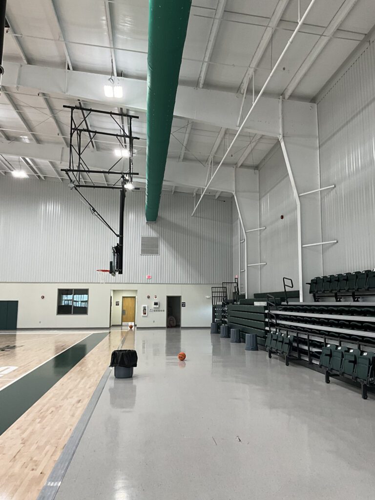 Basketball court interior with seating area