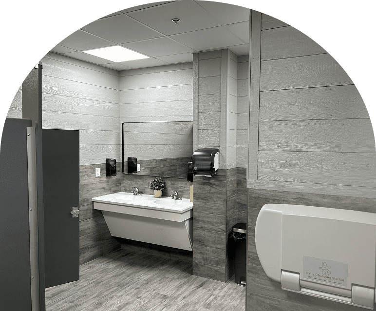 Modern public restroom with grey decor