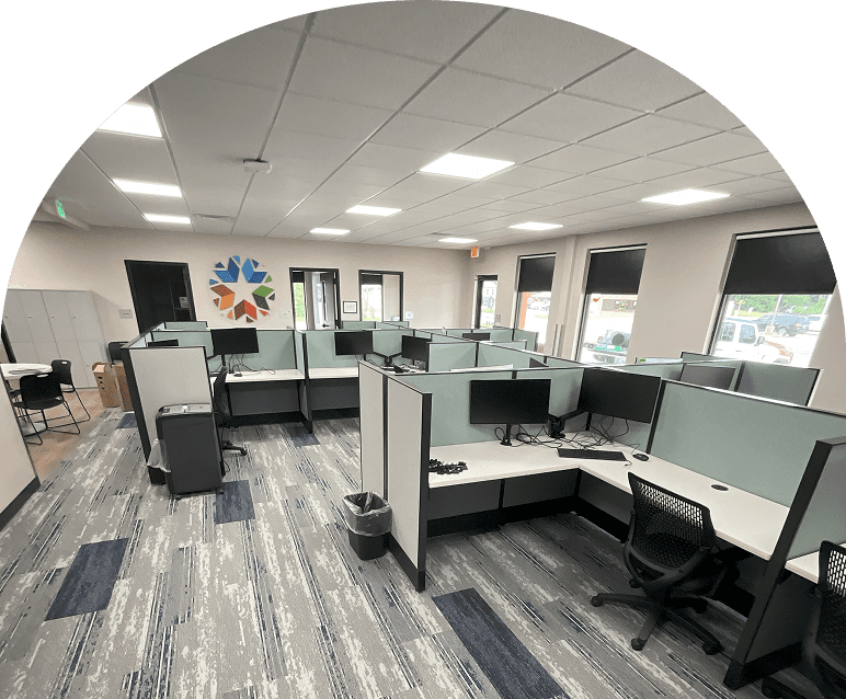 Spacious office with gray partitions