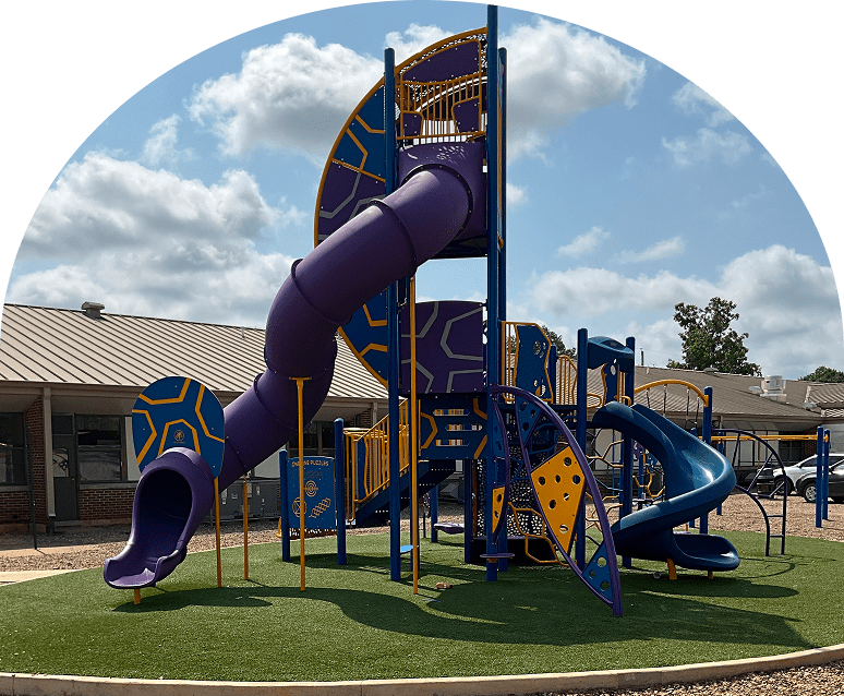 Vibrant play area under a sunny sky.